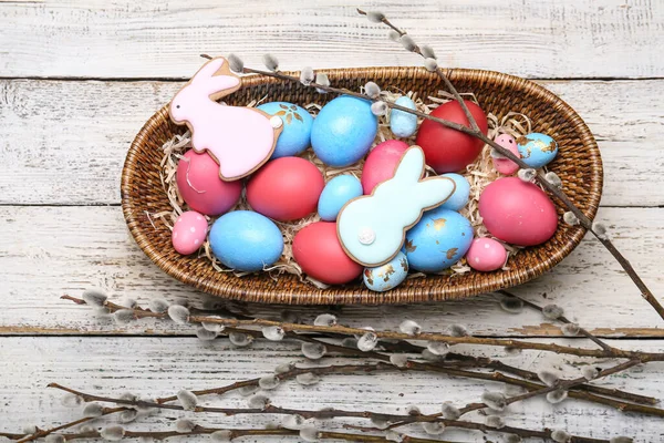 Willow Branches Easter Cookies Basket Painted Eggs Light Wooden Background — Stock Photo, Image