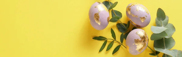 Beautiful Easter Eggs Eucalyptus Branches Yellow Background Space Text — Stock Photo, Image