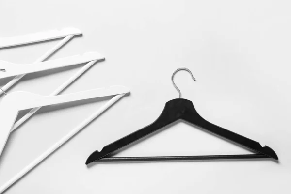 Different Clothes Hangers Light Background Concept Racism — Stock Photo, Image