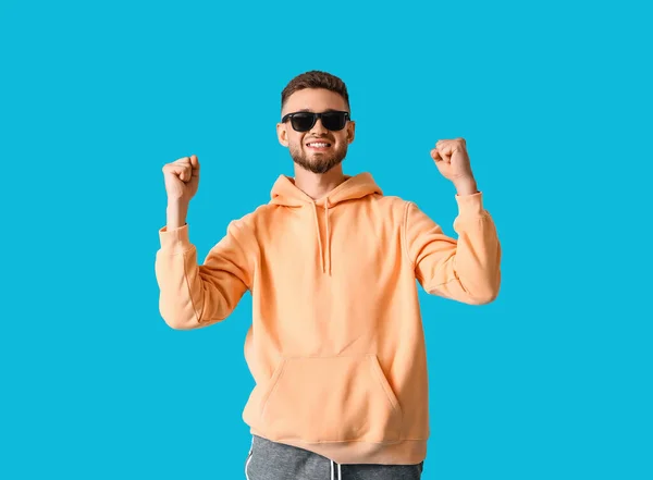 Happy Young Guy Stylish Hoodie Color Background — Stock Photo, Image