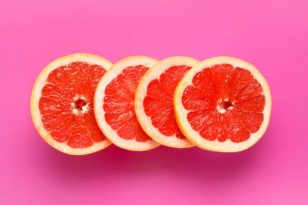 Slices Tasty Ripe Grapefruit Pink Background — Stock Photo, Image