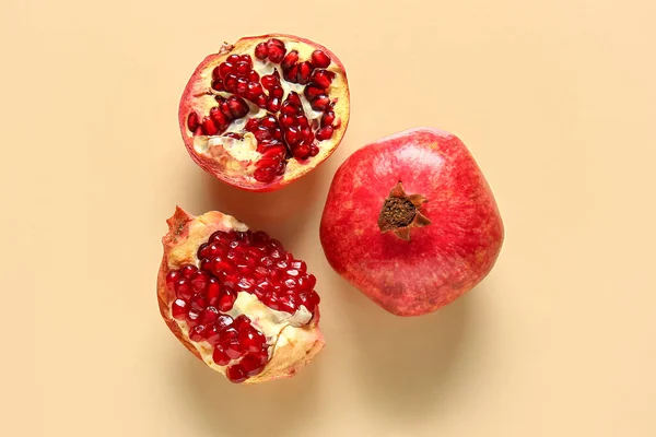 Tasty Ripe Pomegranates Beige Background — Stock Photo, Image