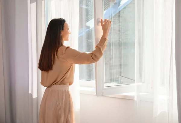 Pretty Young Woman Opening Window Room — Stock Photo, Image