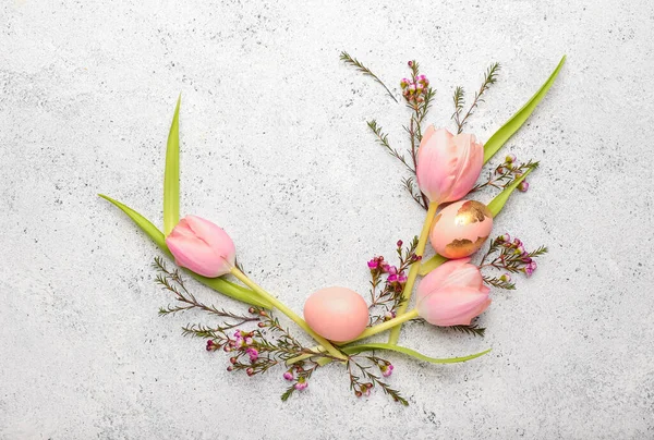 Stylish Wreath Made Beautiful Flowers Easter Eggs Light Background — Stock Photo, Image