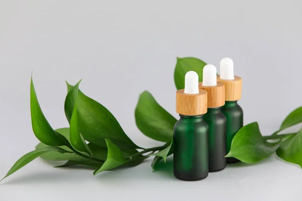 Bottles Natural Cosmetic Product Herbal Extract Grey Background — Stock Photo, Image