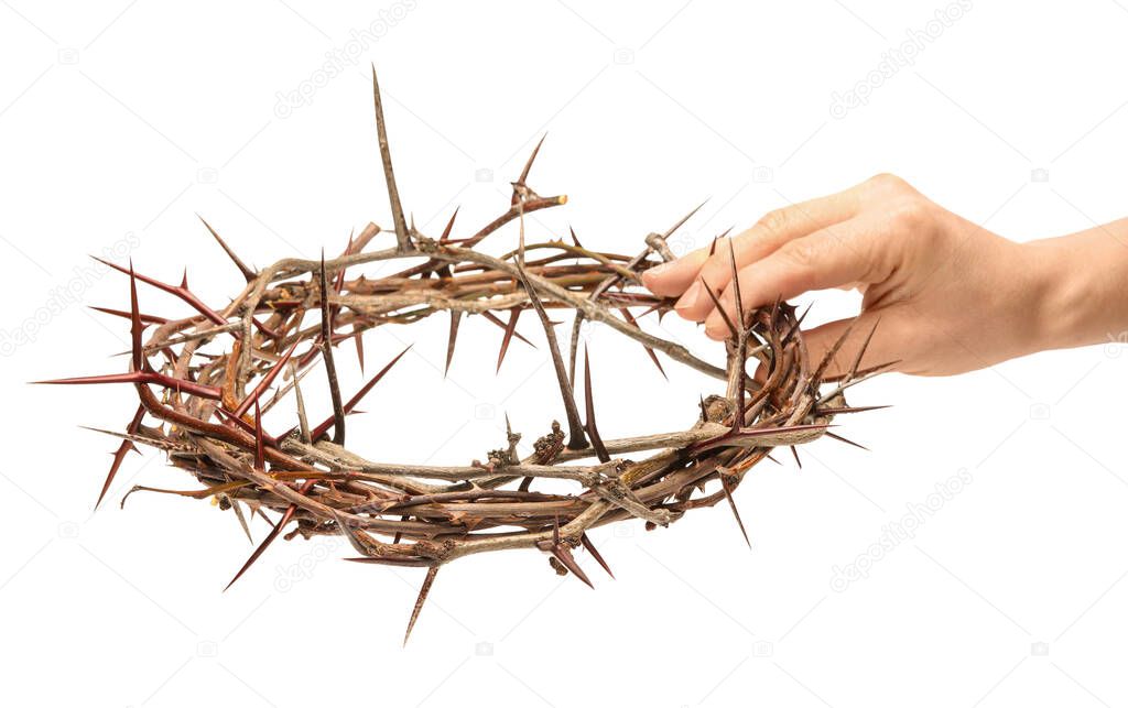 Hand with crown of thorns on white background