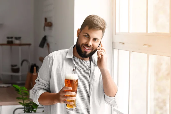 Handsome Bearded Man Glass Beer Talking Mobile Phone Kitchen — Stock Photo, Image