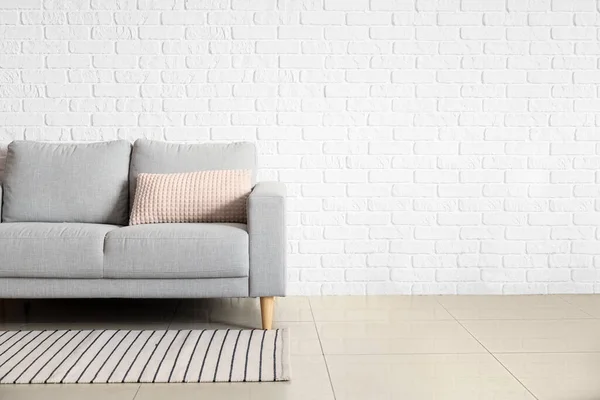 Stylish Sofa White Brick Wall — Stock Photo, Image