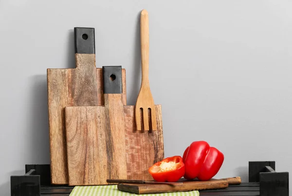 Wooden Cutting Boards Spatula Bell Pepper Table Light Wall — Stock Photo, Image