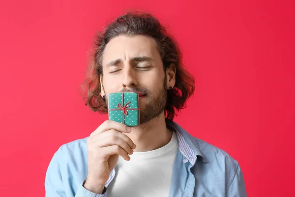 Happy Young Man Christmas Cookie Red Background — Stock Photo, Image