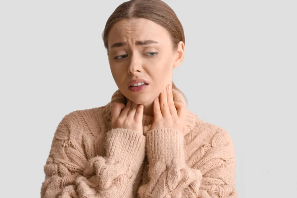 Ill Young Woman Sore Throat Light Background — Stock Photo, Image