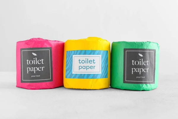 stock image Toilet paper rolls on light background