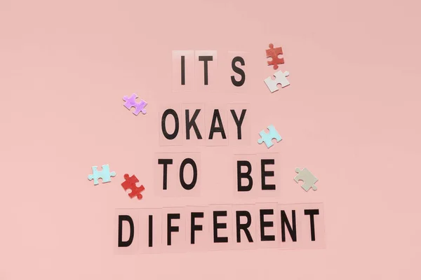 Text Okay Different Puzzle Pieces Pink Background Concept Autistic Disorder — Stock Photo, Image