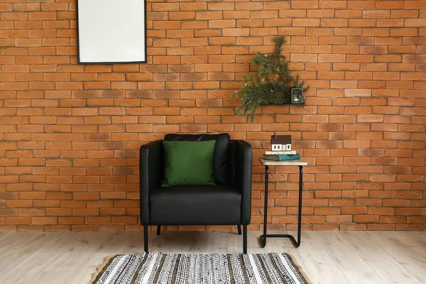 Fir Branches Shelf Armchair Table Brick Wall — Stock Photo, Image