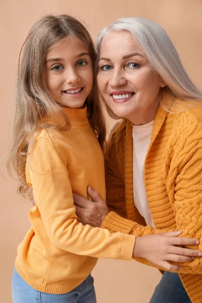 https://st.depositphotos.com/10614052/55095/i/450/depositphotos_550957124-stock-photo-little-girl-with-her-grandma.jpg