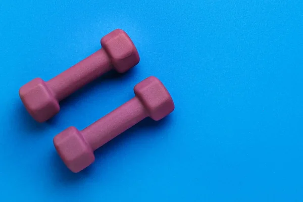 Stylish Dumbbells Blue Background — Stock Photo, Image