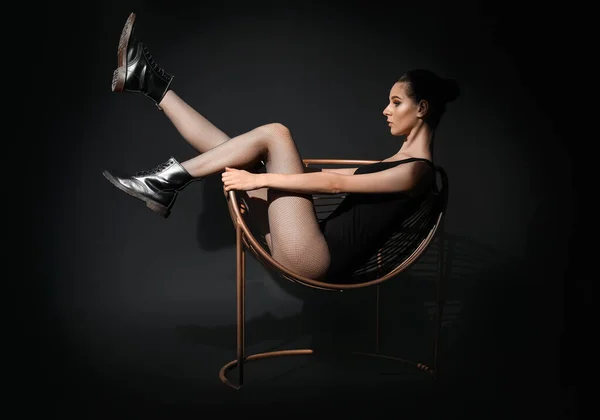 Fashionable Young Woman Black Tights Sitting Armchair Dark Background — Stock Photo, Image