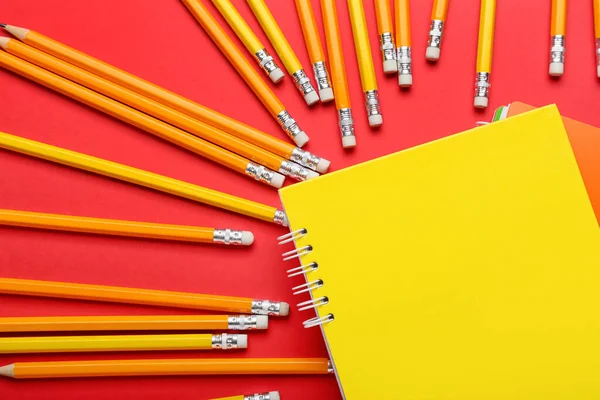Notebook Ordinary Pencils Red Background Closeup — Stock Photo, Image