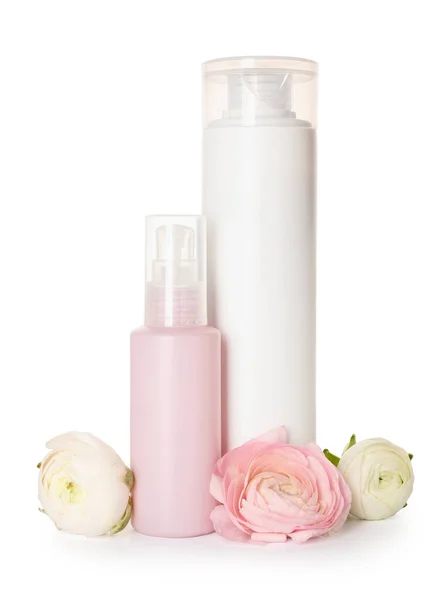 Bottles Cosmetic Products Ranunculus Flowers White Background — Stock Photo, Image