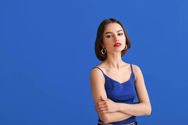 Young Woman Red Lips Crossed Hands Blue Background — Stock Photo, Image