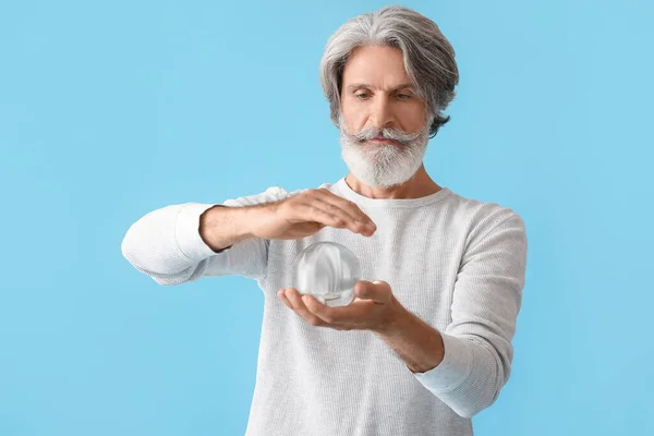 Mature Man Crystal Ball Color Background — Stock Photo, Image