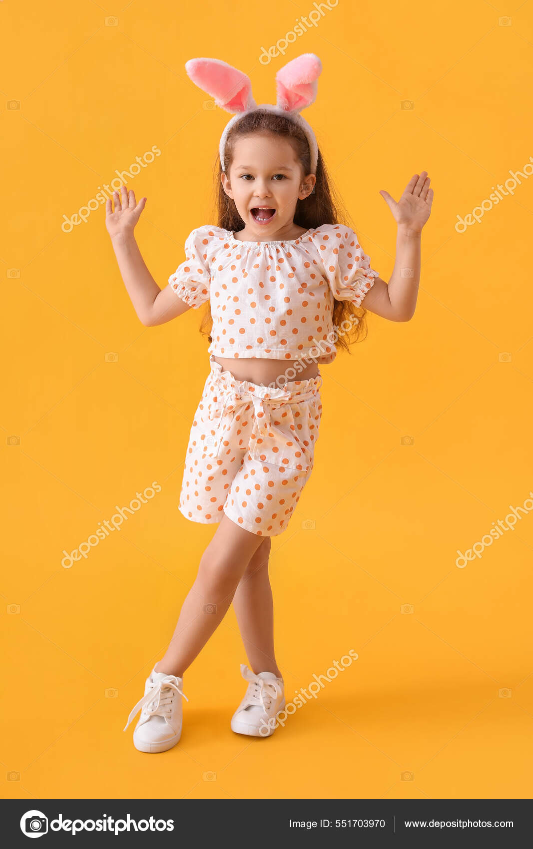 Cute Little Girl Bunny Ears Yellow Background Stock Photo by ©serezniy