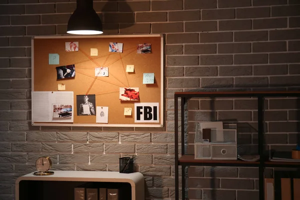 Interior of modern FBI agent\'s office at night