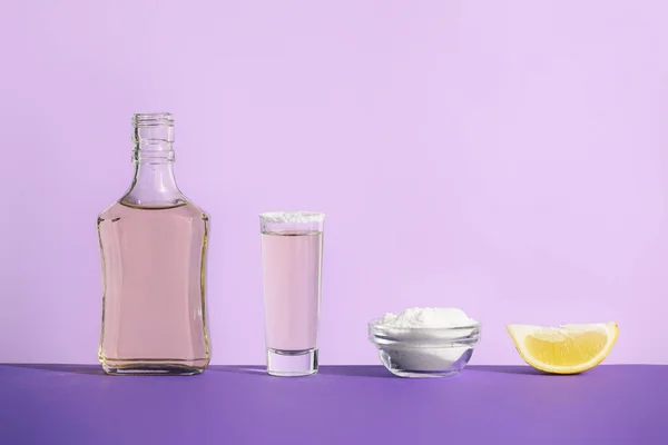 Bottle Glass Tasty Tequila Salt Lemon Color Background — Stock Photo, Image