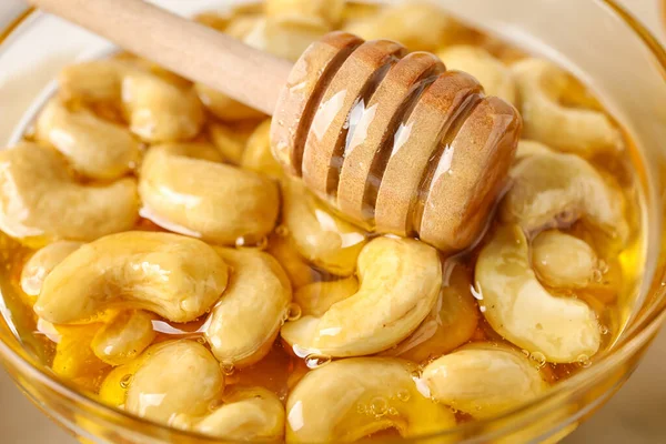 Bowl Sweet Cashew Nuts Honey Dipper Closeup — Stock Photo, Image