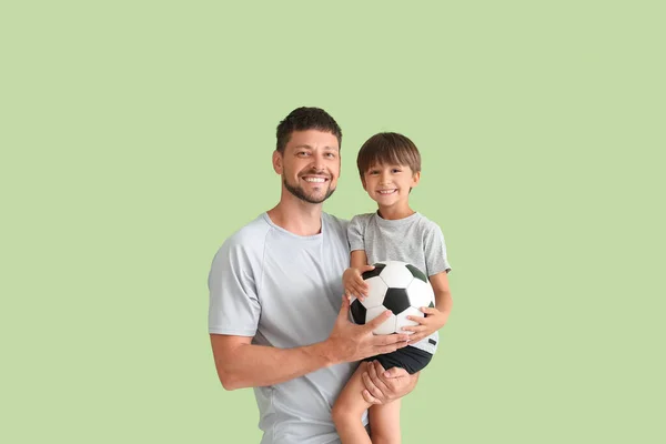 Male Trainer Little Boy Ball Green Background — Stock Photo, Image