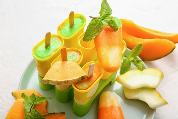 Plate Tasty Melon Popsicles Light Background — Stock Photo, Image
