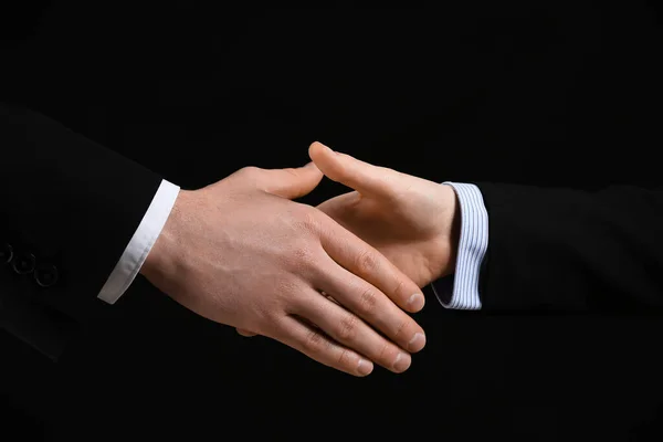 Business Colleagues Shaking Hands Black Background Closeup — Stock Photo, Image