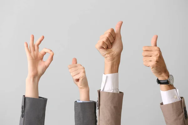 Business People Gesturing Light Background — Stock Photo, Image