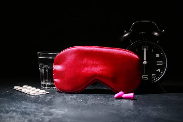 Sleep Mask Alarm Clock Pills Earplugs Dark Background — Stock Photo, Image