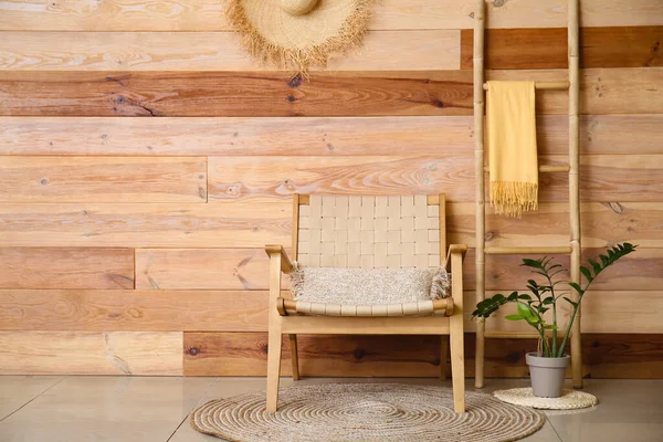 Stylish Armchair Ladder Houseplant Wooden Wall — Stock Photo, Image