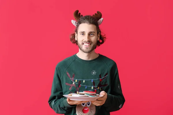 Happy Young Man Deer Horns Holding Plate Gingerbread Cookies Red — Stock Photo, Image