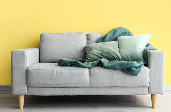 Stylish Sofa Yellow Wall — Stock Photo, Image