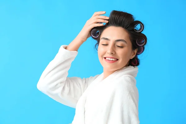 Beautiful Young Woman Bathrobe Hair Curlers Blue Background — Stock Photo, Image