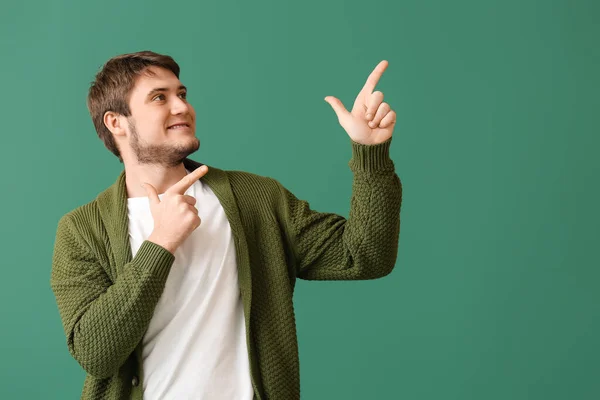 Handsome Young Man Pointing Something Green Background — Stock Photo, Image