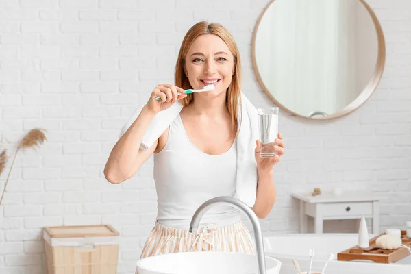 Beautiful Mature Woman Brushing Teeth Bathroom — Stock Photo, Image