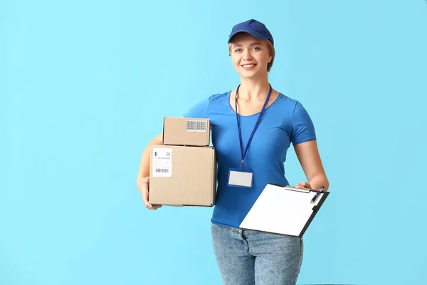 Female Courier Parcels Clipboard Color Background — Stock Photo, Image