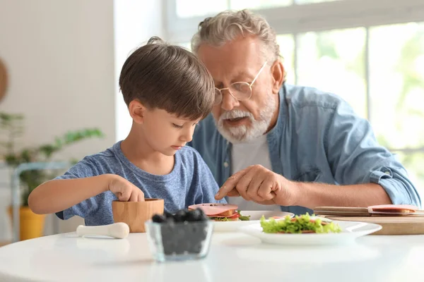Little Boy Making Sandwich His Grandfather Table Kitchen — Stock Photo, Image