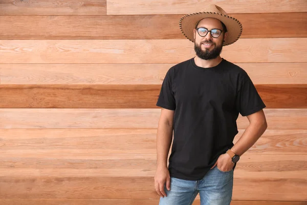 Stylish Young Man Black Shirt Wooden Background — Stock Photo, Image