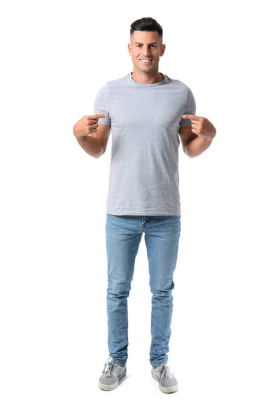 Handsome young man in stylish t-shirt isolated on white