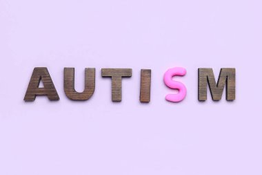 Leylak arkaplanındaki sözcük AUTISM