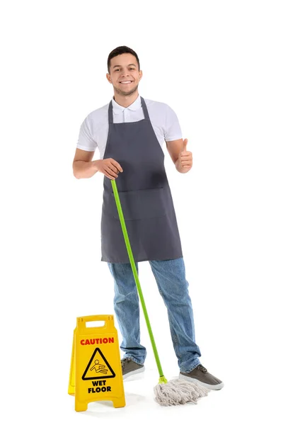 Young Male Worker Cleaning Service Mop Caution Sign Showing Thumb — Stock Photo, Image