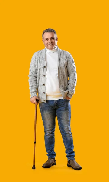 Senior Man Walking Stick Yellow Background — Stock Photo, Image