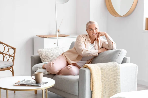 Mature Woman Sitting Soft Sofa — Stock Photo, Image