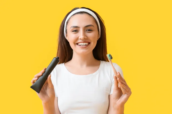 Beautiful Young Woman Activated Charcoal Tooth Paste Brush Yellow Background — Stock Photo, Image