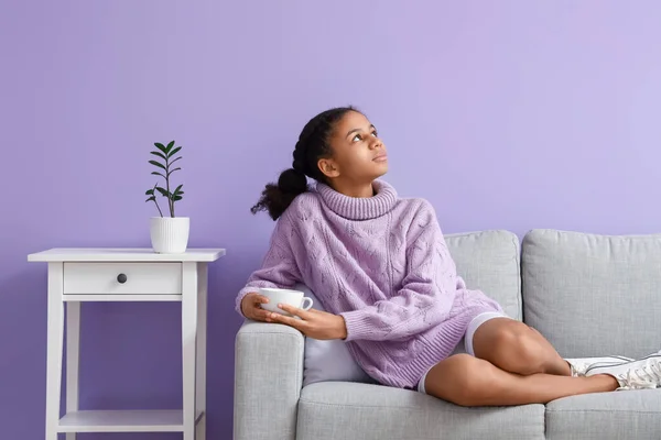 African American Teenage Girl Drinking Tea While Sitting Sofa Home — Stock Photo, Image